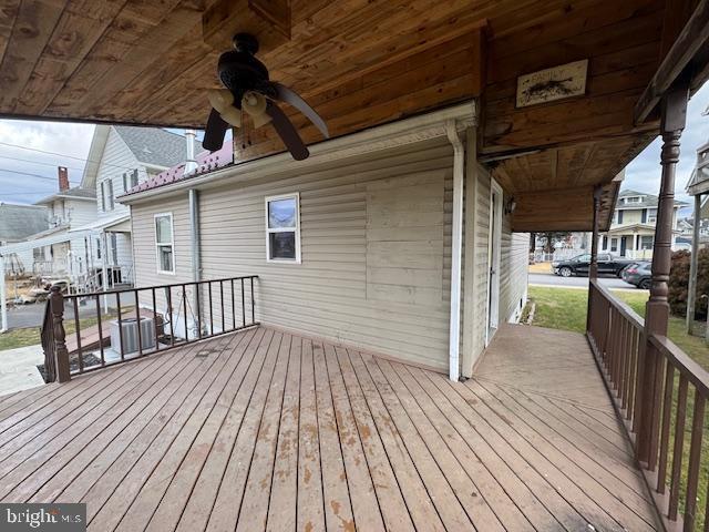 wooden deck with ceiling fan