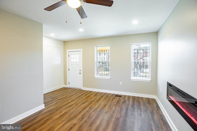 entryway featuring dark hardwood / wood-style floors and ceiling fan