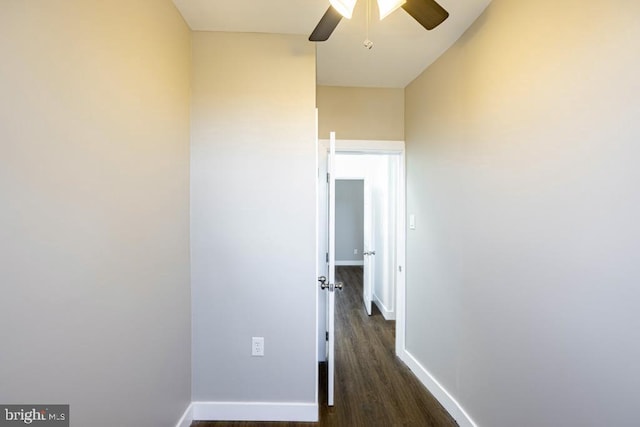 hall with dark hardwood / wood-style flooring