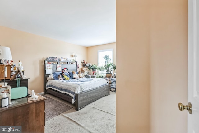 bedroom featuring carpet