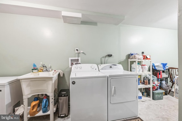 laundry room with washer and dryer