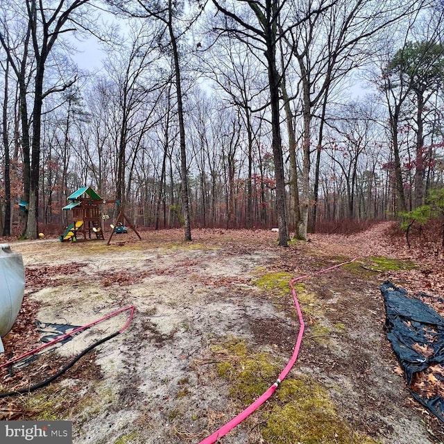 view of yard with a playground