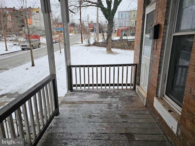 view of snow covered deck