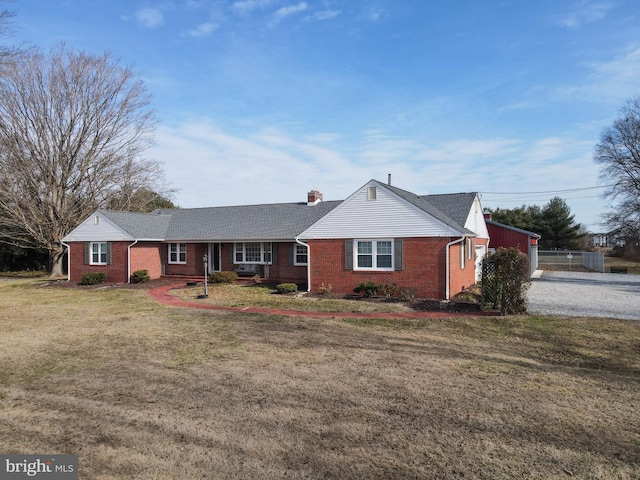 ranch-style house with a front lawn