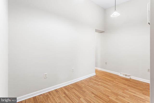 empty room featuring hardwood / wood-style floors