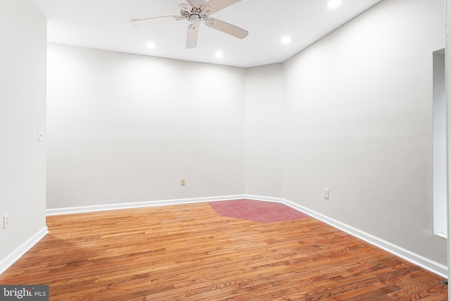 spare room with ceiling fan and light hardwood / wood-style floors