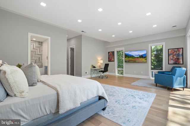 bedroom with light wood-type flooring