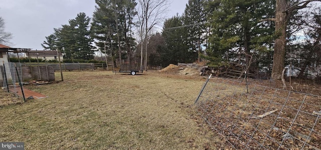 view of yard featuring fence