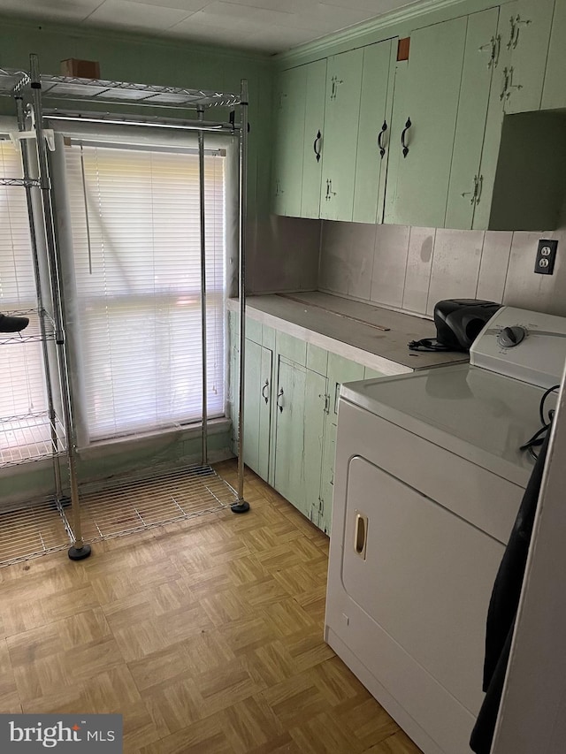 10037 Main St, Berlin, MD 21811 - laundry area featuring washer / dryer and cabinet space