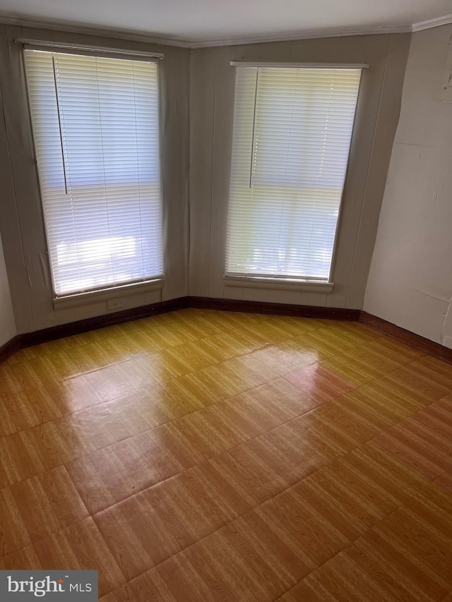 10037 Main St, Berlin, MD 21811 - unfurnished room featuring baseboards and crown molding