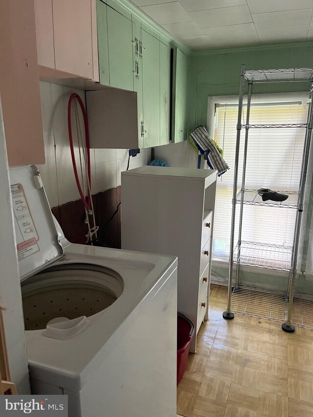 10037 Main St, Berlin, MD 21811 - washroom featuring cabinet space and washer / clothes dryer