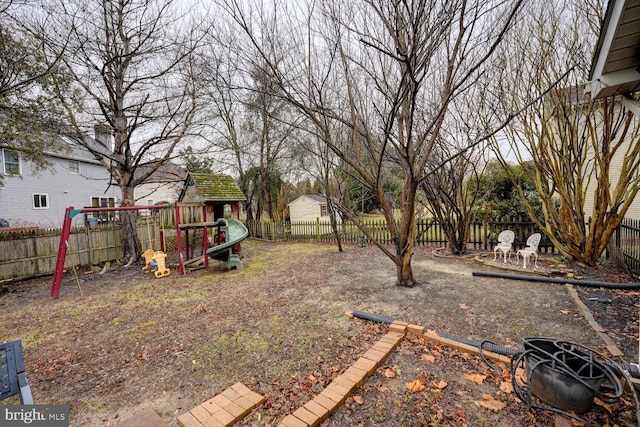 view of yard with a playground