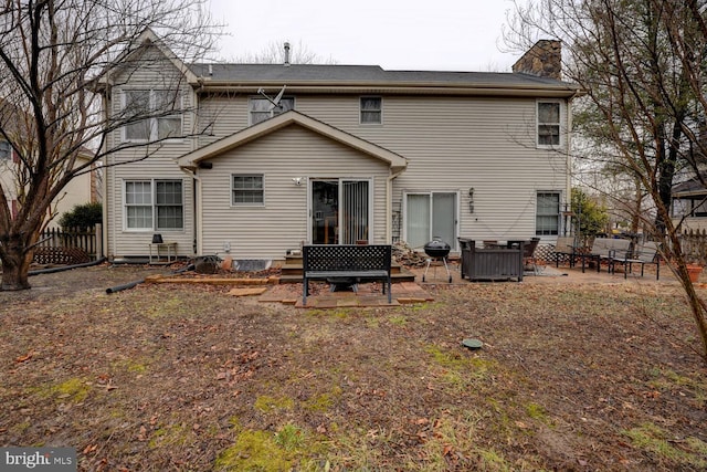 rear view of property with a patio