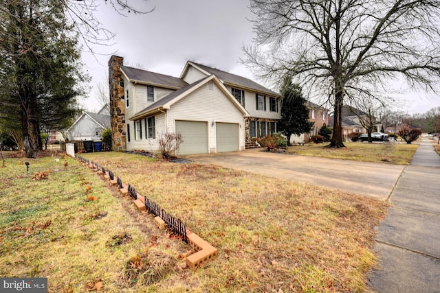 view of home's exterior featuring a garage and a yard