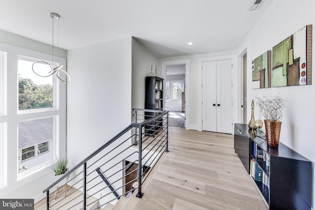 hallway featuring light hardwood / wood-style floors