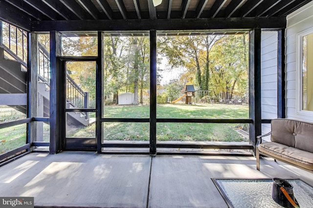 unfurnished sunroom with plenty of natural light