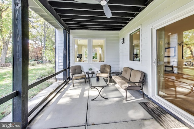 sunroom / solarium with ceiling fan