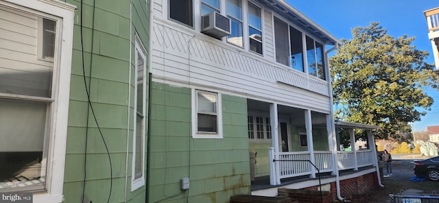 view of home's exterior featuring a sunroom