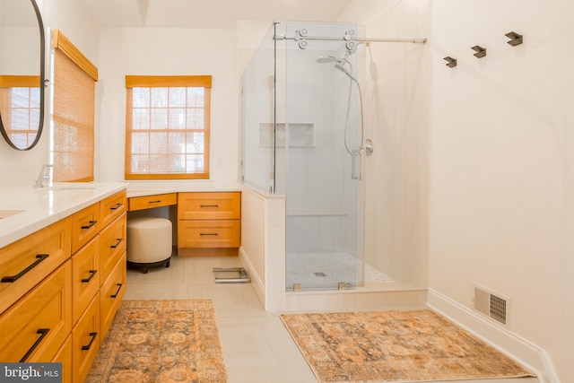 bathroom with vanity and walk in shower