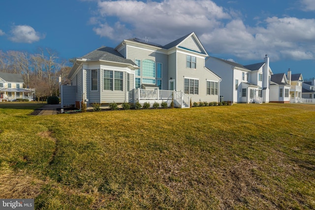 view of front facade featuring a front yard