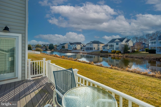 balcony with a deck with water view