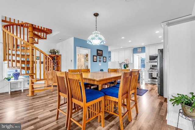 dining space featuring light hardwood / wood-style floors