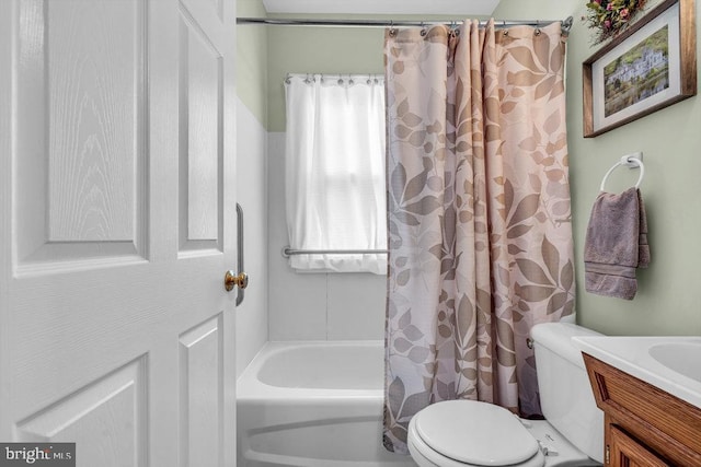 full bathroom with vanity, toilet, and shower / bath combo