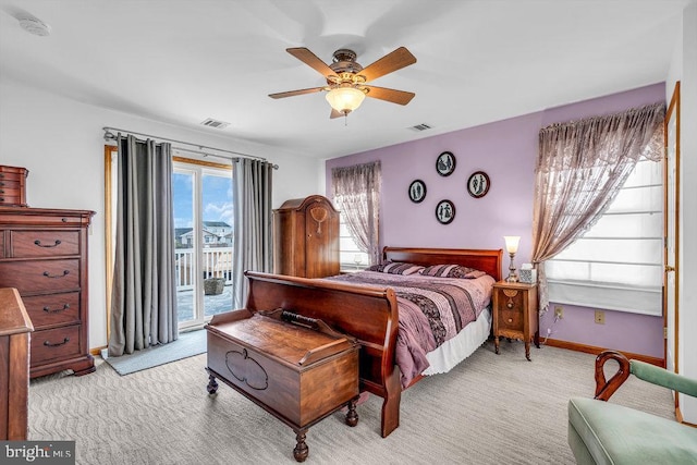 bedroom with light colored carpet, access to exterior, and ceiling fan