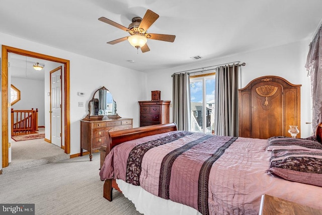 carpeted bedroom featuring access to outside and ceiling fan