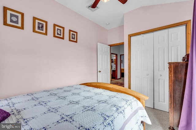 bedroom featuring carpet, ceiling fan, and a closet