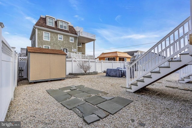 exterior space featuring a shed