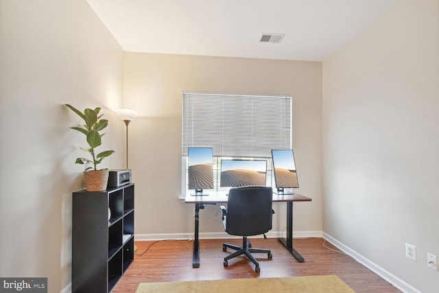 office space featuring hardwood / wood-style floors