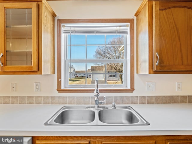 kitchen featuring sink and a wealth of natural light