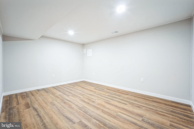 basement featuring light hardwood / wood-style floors