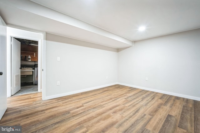 empty room featuring wood-type flooring