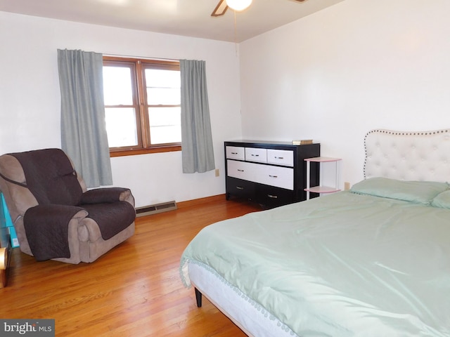 bedroom featuring hardwood / wood-style floors