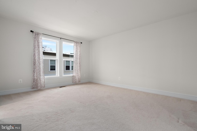 view of carpeted spare room