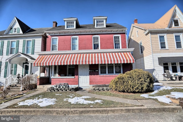 multi unit property featuring covered porch