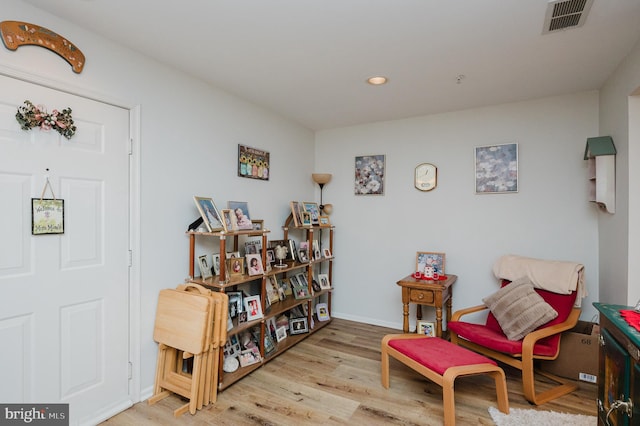 living area featuring light hardwood / wood-style floors