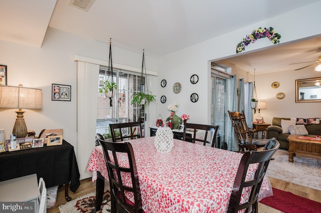 dining room featuring hardwood / wood-style flooring and ceiling fan