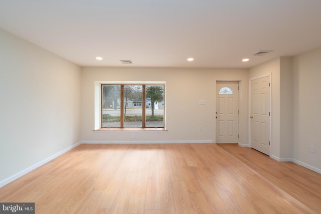 foyer entrance featuring light hardwood / wood-style floors