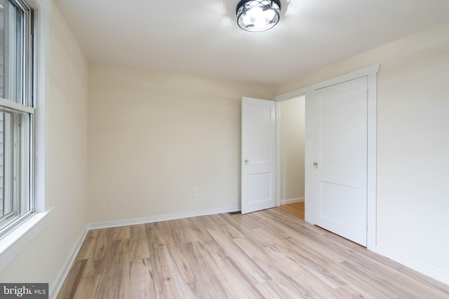 unfurnished bedroom with light hardwood / wood-style floors