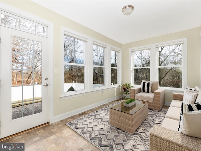 sunroom featuring a wealth of natural light