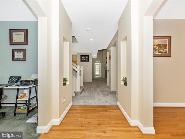 hallway featuring light hardwood / wood-style floors