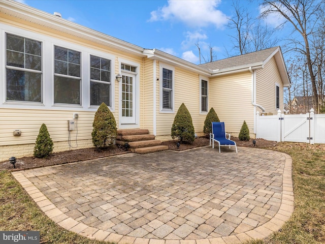 back of property featuring a patio area