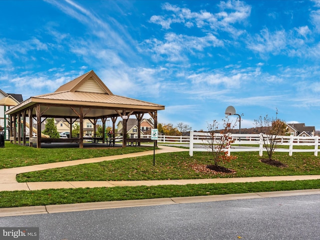 view of community featuring a yard