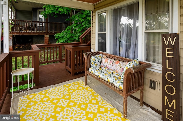 deck with covered porch