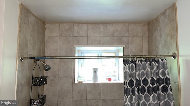 bathroom with walk in shower