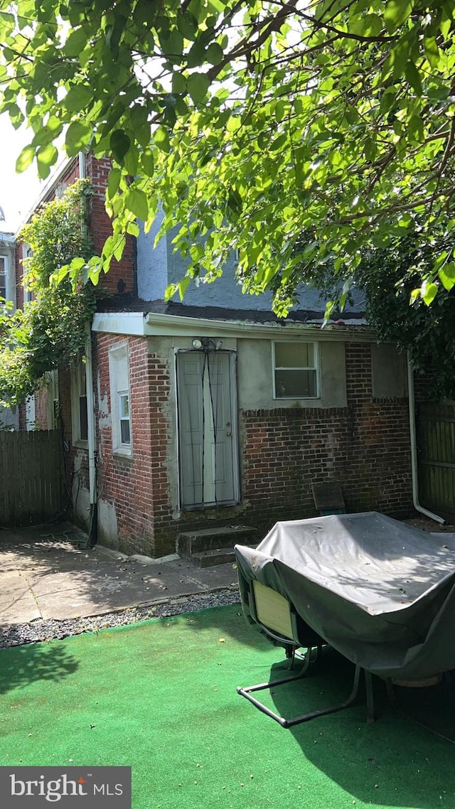 view of outbuilding featuring a yard