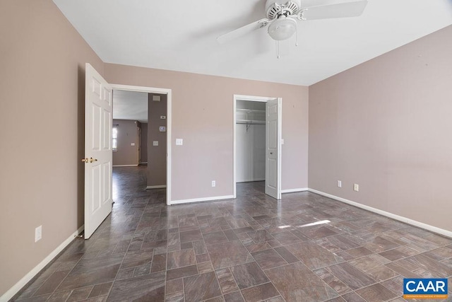 unfurnished bedroom with a closet and ceiling fan